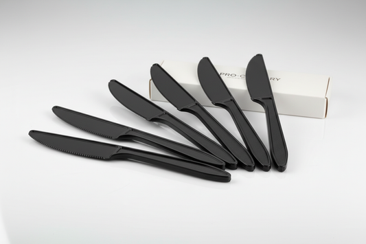 Heavy Duty Black Plastic Knives for restaurants take away in studio back ground